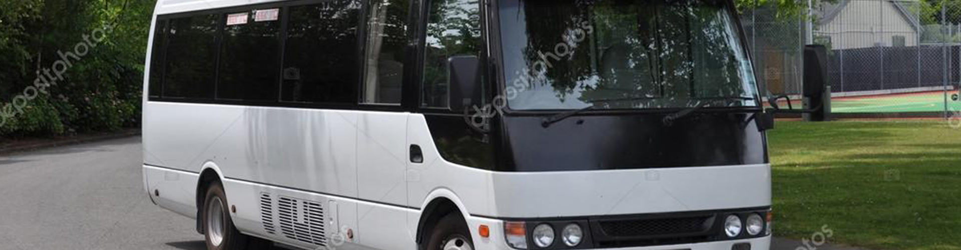 A bus parked on a roadside for special event transportation