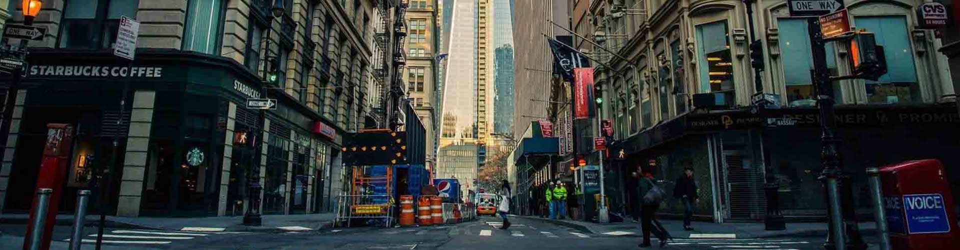 A city street in New York with buses and cars