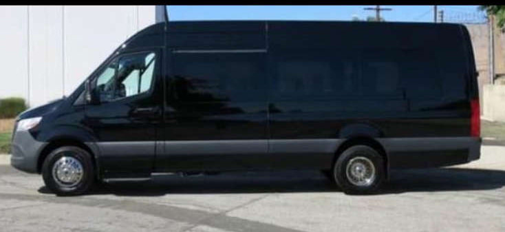 A white bus with premium seating for scenic tours