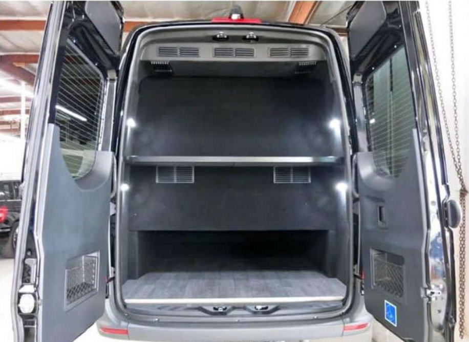 A van with open doors for easy access to passengers