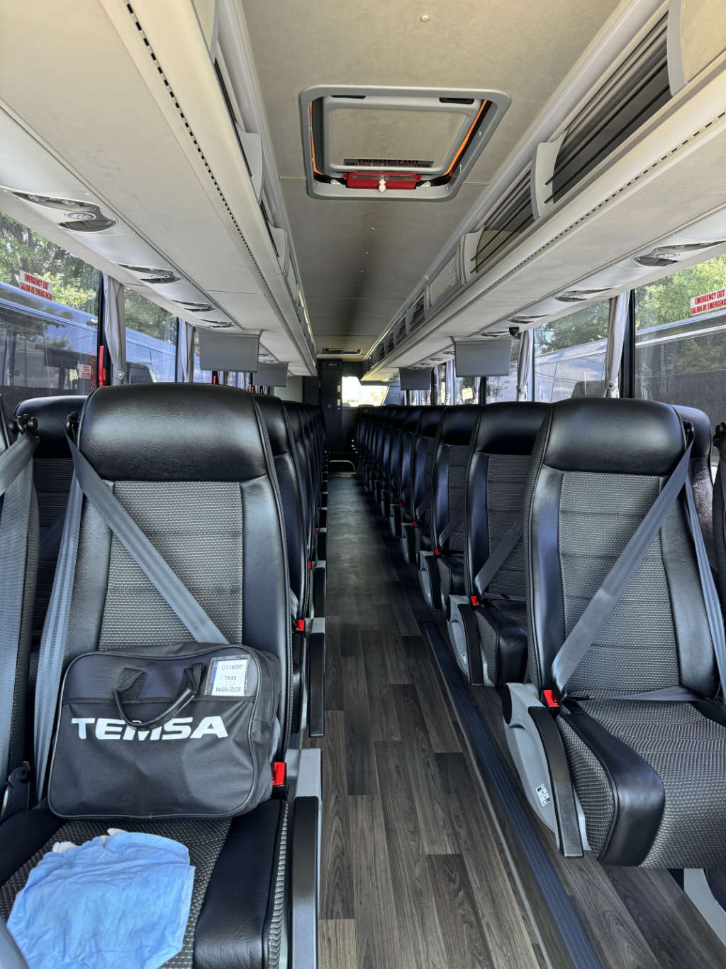 A bus with seating designed for large groups