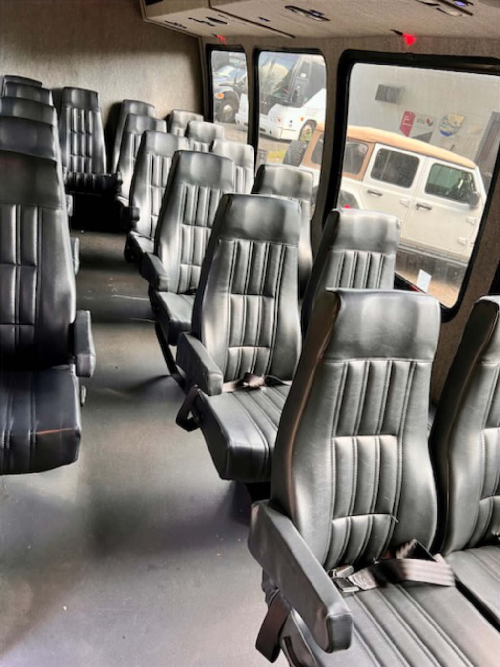 A row of seats designed for comfort on a charter bus