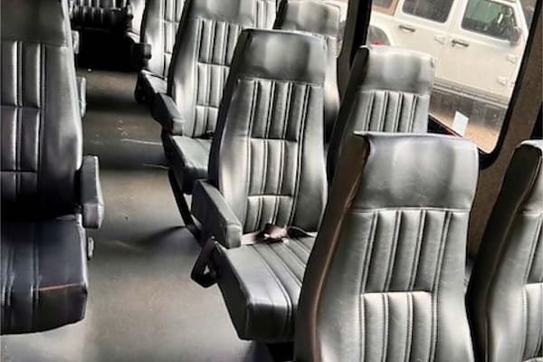 A row of seats designed for comfort on a charter bus