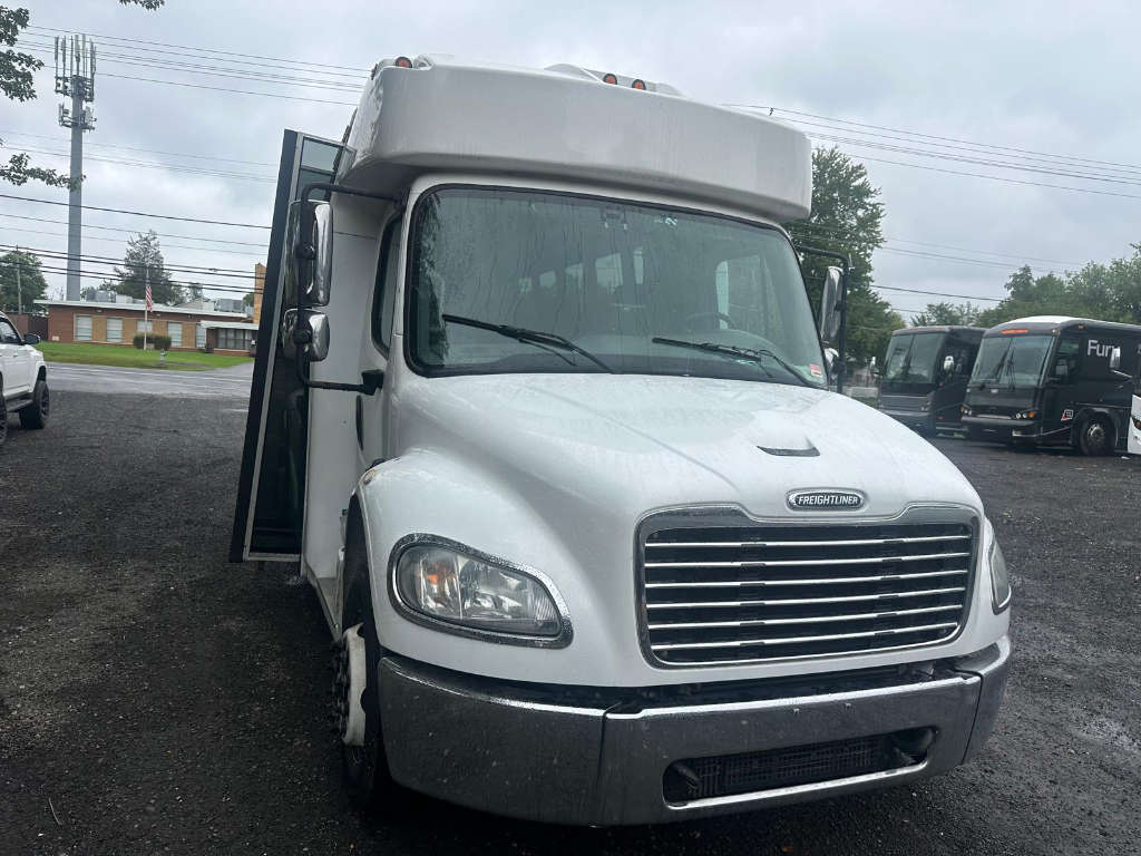 A white truck with black seats and a premium finish for charters