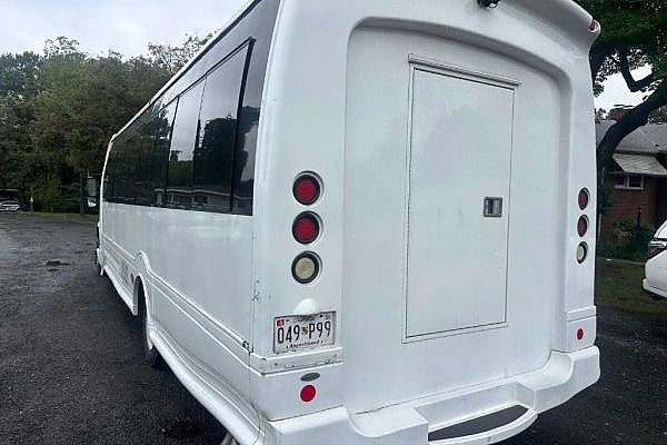 A white bus with comfortable seats for long-distance travel