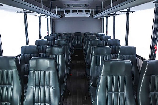 A bus with numerous seats for group transportation